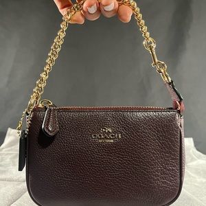 SOLD!! Dark burgundy Coach 2-Way Wristlet (No longer available for sale)